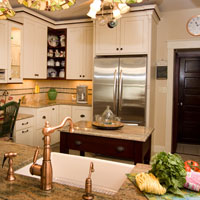 Light wood cabinets with granite kitchen counter tops