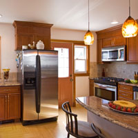 Medium Brown Kitchen Cabinets and Granite Counter Tops