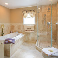 Bathtub with glass wall shower